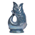 The Artisan Cheese Room XL Gluggle Jug in a reflective denim blue lustre finish with iconic fish-shaped design.