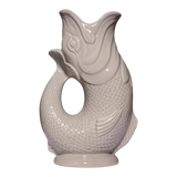 The Artisan Cheese Room Original Gluggle Jug in a mushroom earthy neutral tone with an iconic fish-shaped design.