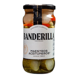 The Artisan Cheese Room Maestros Banderilla jar containing sliced pickles and peppers in brine