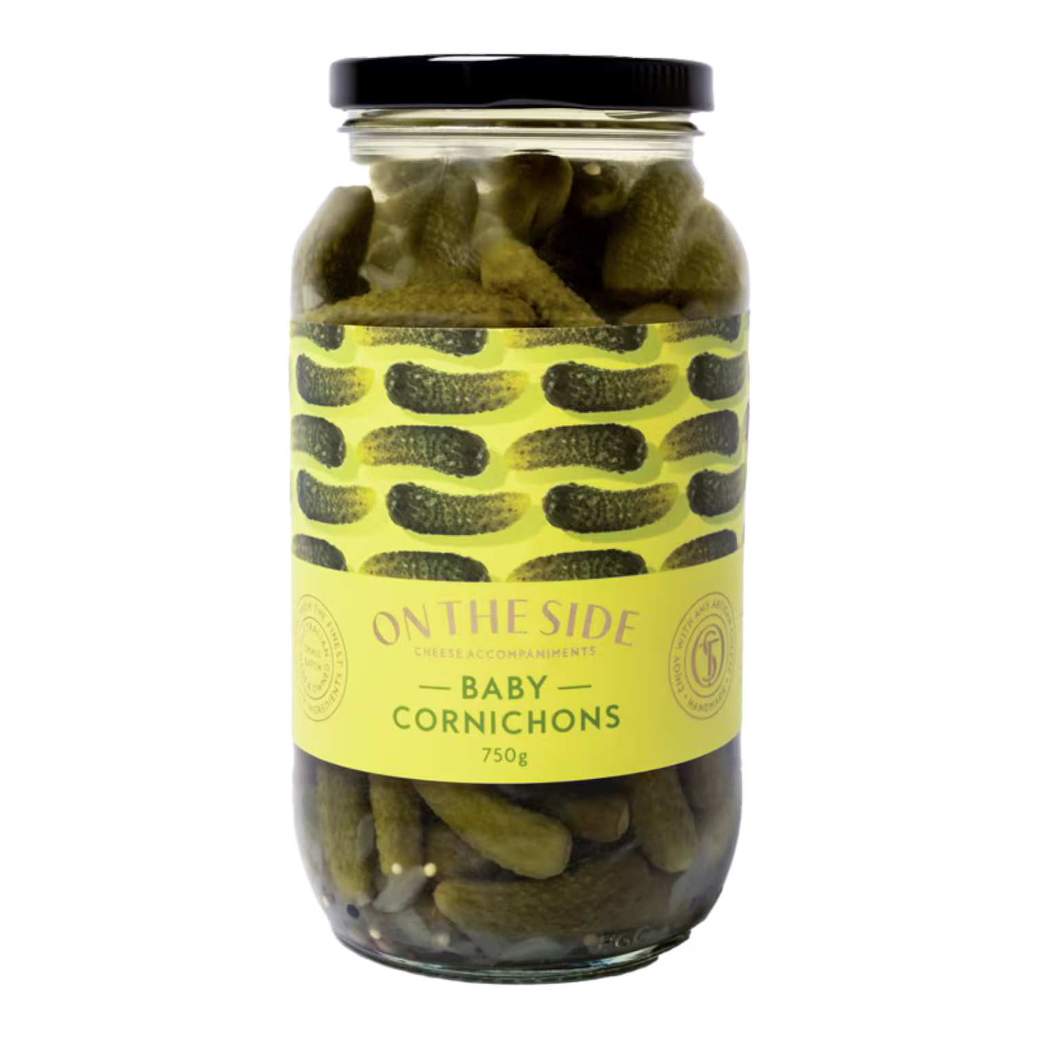 The Artisan Cheese Room jar of baby cornichons with a yellow label featuring a pickle pattern
