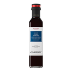 The Artisan Cheese Room Gardeny Pedro Ximenez balsamic vinegar in a tall glass bottle with a black cap.