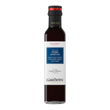 The Artisan Cheese Room Gardeny Pedro Ximenez balsamic vinegar in a tall glass bottle with a black cap.