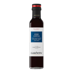 The Artisan Cheese Room Gardeny Pedro Ximenez balsamic vinegar in a tall glass bottle with a black cap.
