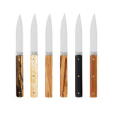The Artisan Cheese Room set of six Perceval 9.47 steak knives featuring diverse exotic wood handles and steel blades.