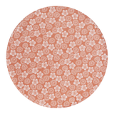 The Artisan Cheese Room Le Jacquard Francais round pink placemat with white Japanese kimono-inspired floral pattern.