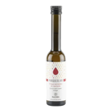The Artisan Cheese Room Parqueoliva quince semi-sweet vinegar in a tall glass bottle with a minimalist label.