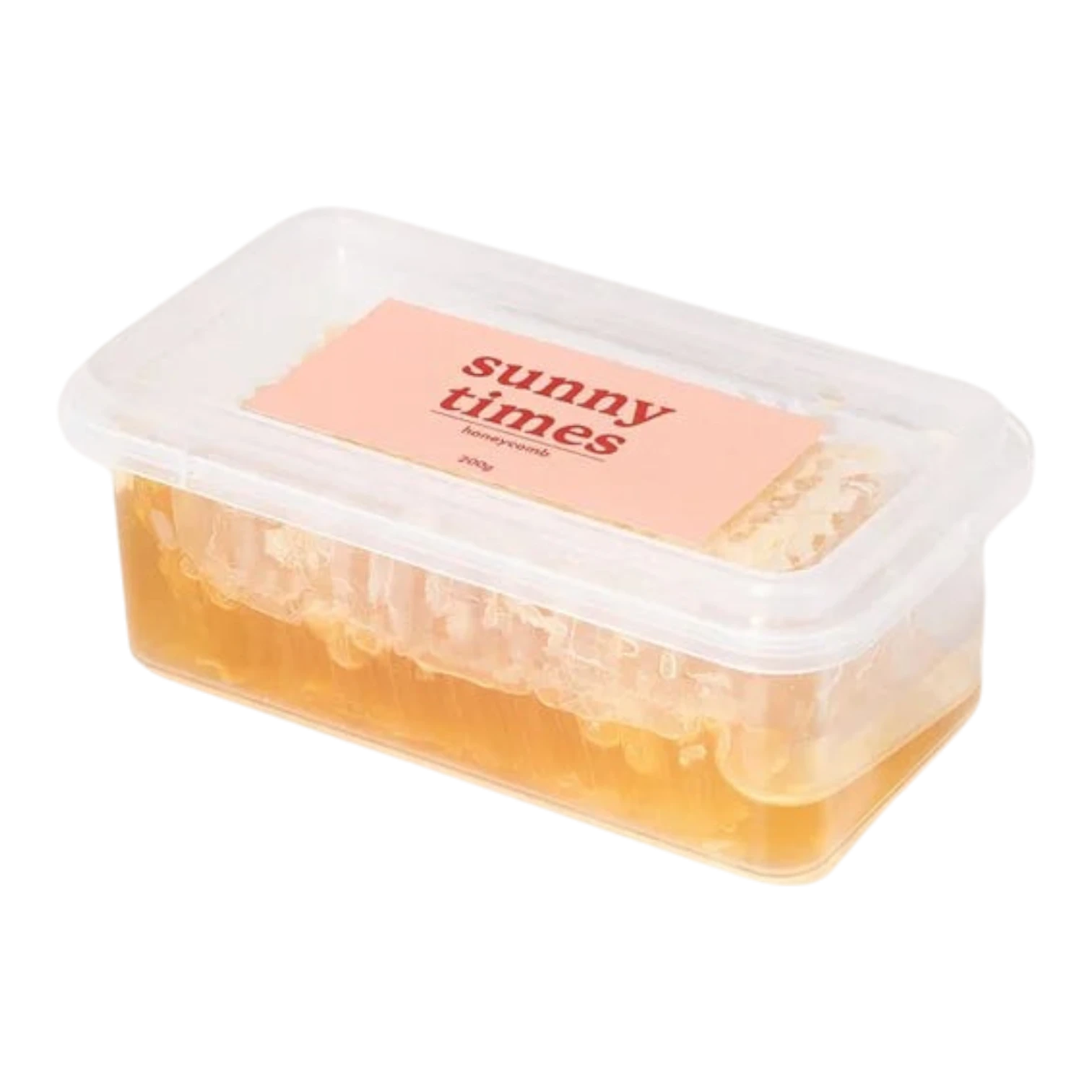 The Artisan Cheese Room Sunny Times raw honeycomb in a clear plastic container with a pink label on a white background