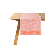 The Artisan Cheese Room Le Jacquard Francais Wagara pink cotton table runner with Japanese-inspired floral motifs.